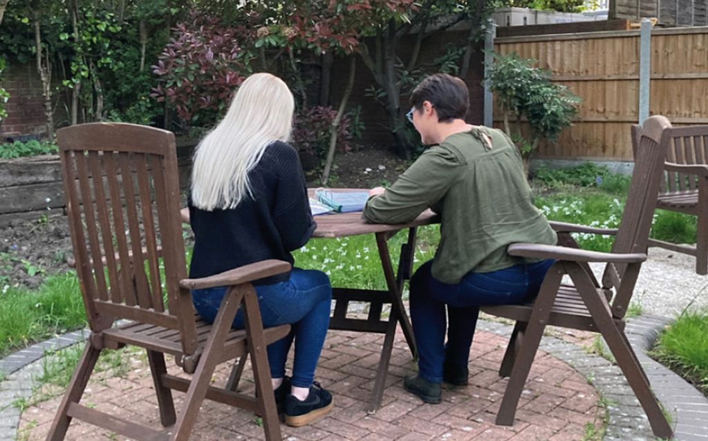 Crisis support worker and client working together at Mind in Croydon’s Recovery Space