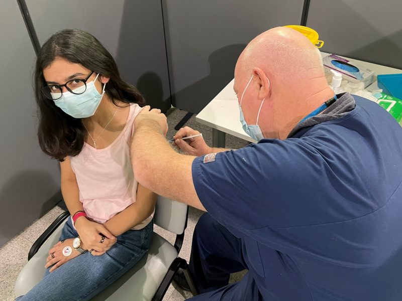 A patient getting their Covid-19 vaccination at a South West London vaccination centre
