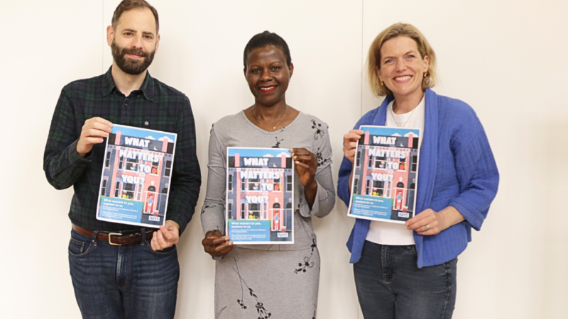 Local people celebrate winning a poster competition