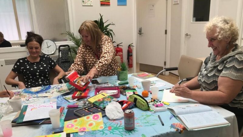 Members of the Wilson art club Mitcham working on projects