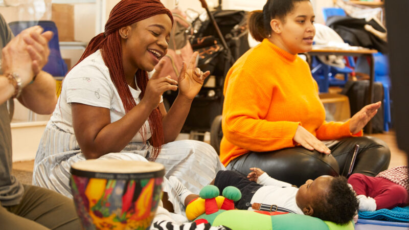Mums and babies singing and clapping in Breathe Melodies for Mums session