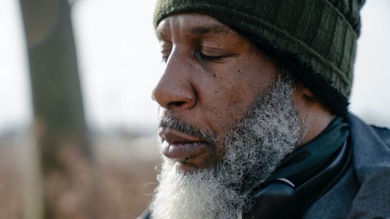Older man breathing to illustrate story about checking air quality in Merton
