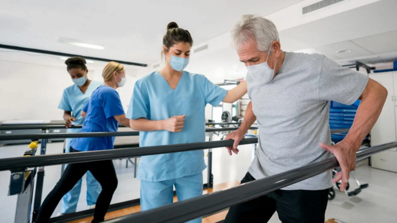 A physio helps a patient at the Richmond Long Covid Clinic
