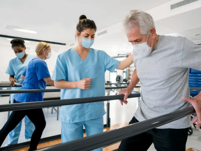 A physio helps a patient at the Richmond Long Covid Clinic