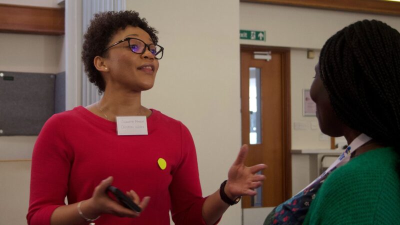 Two women chatting at south west London voluntary sector mental health event