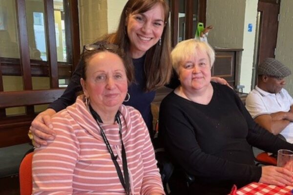 Women of Wandsworth intergenerational project, Senia Dedic from the project (centre) with group members having tea