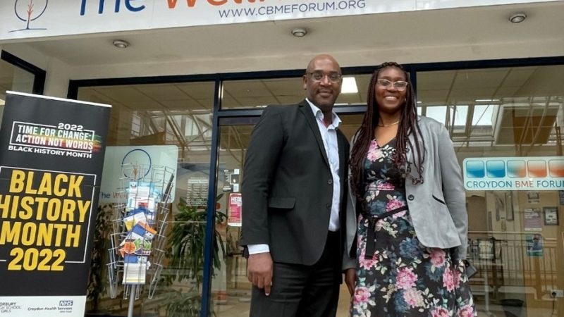 By Dr Gloria Rowland, Chief Nursing and Allied Health Professional Officer and Director for Patient Outcomes for NHS South West London ICB, and Andrew Brown, Chief Executive of Croydon BME Forum, outside The Wellness Centre in Croydon
