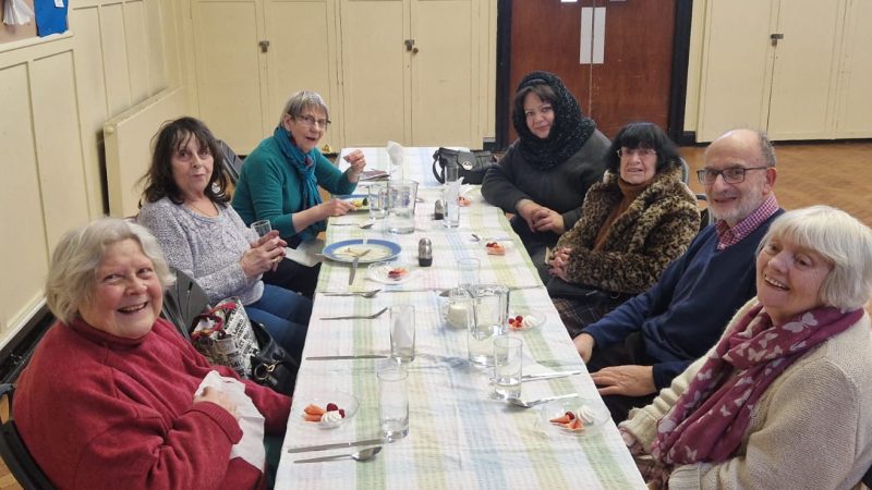 Kingston residents meet for lunch at a Living Well Hub in New Malden